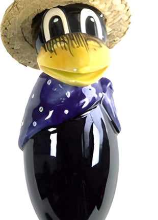 Raven with and straw hat and dark blue scarf with white dots from Goose and Company